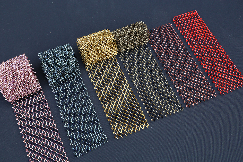 Coil drapery woven in six finishes, shown as hanging strips