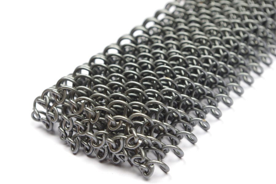 Stainless steel coil drapery, close view of the diamond mesh and ring joints