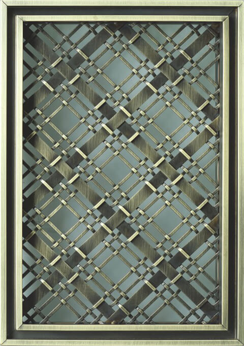 Woven metal fabric panel in a copper finish, framed sample